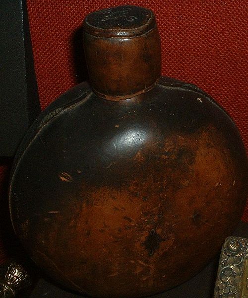 A 19th-century leather bottle